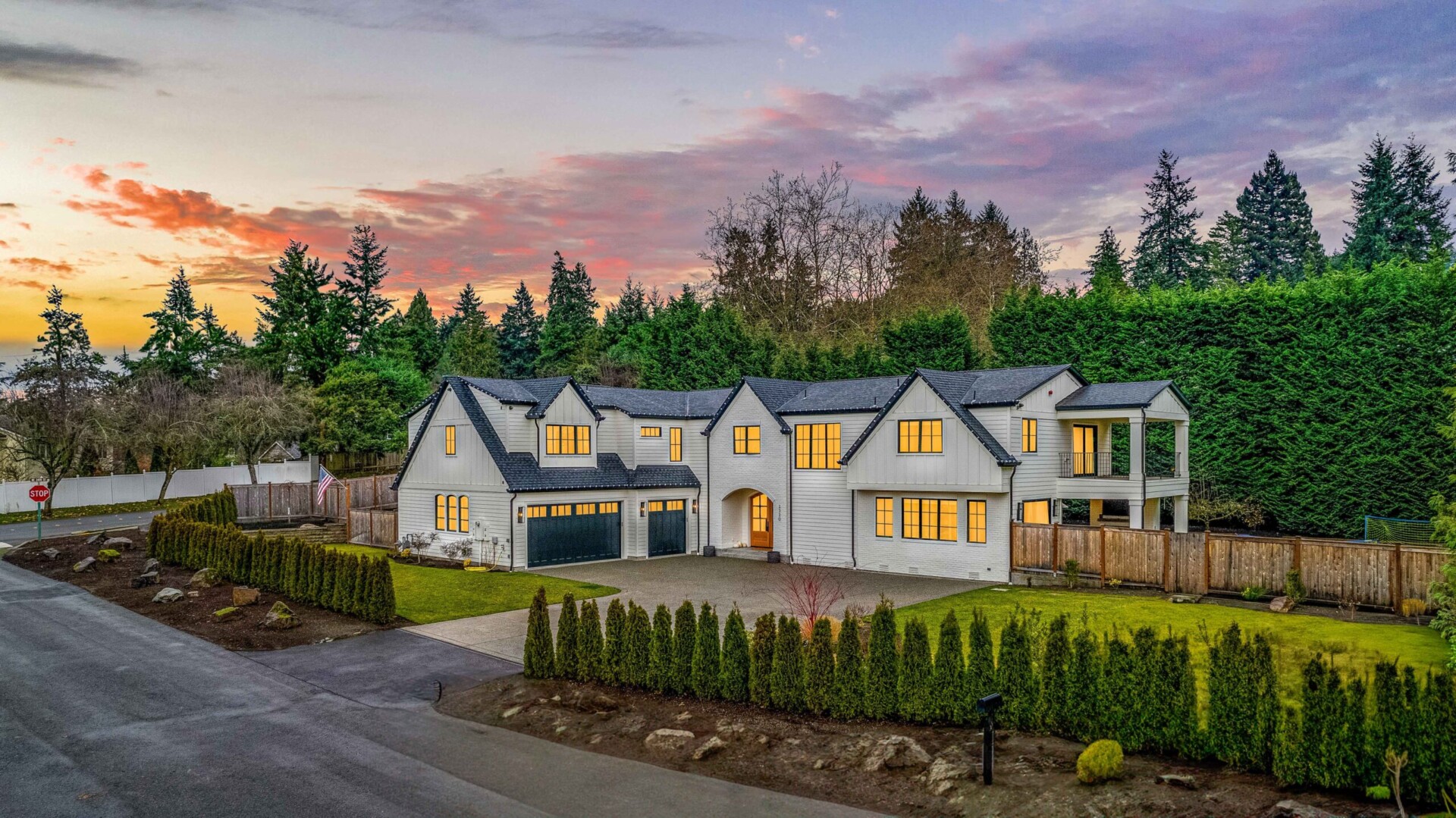 Aerial photograph of a modern farmhouse at twilight