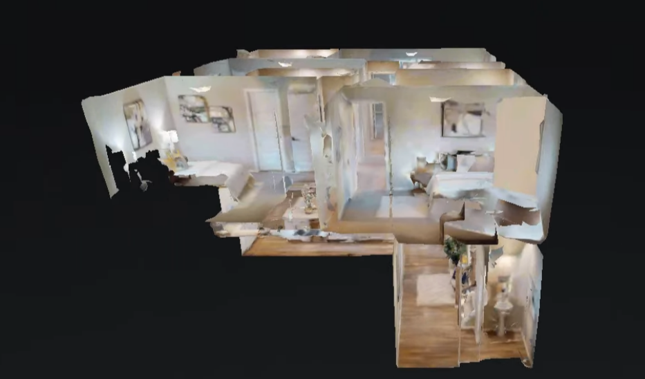 3D dollhouse view of a furnished home interior