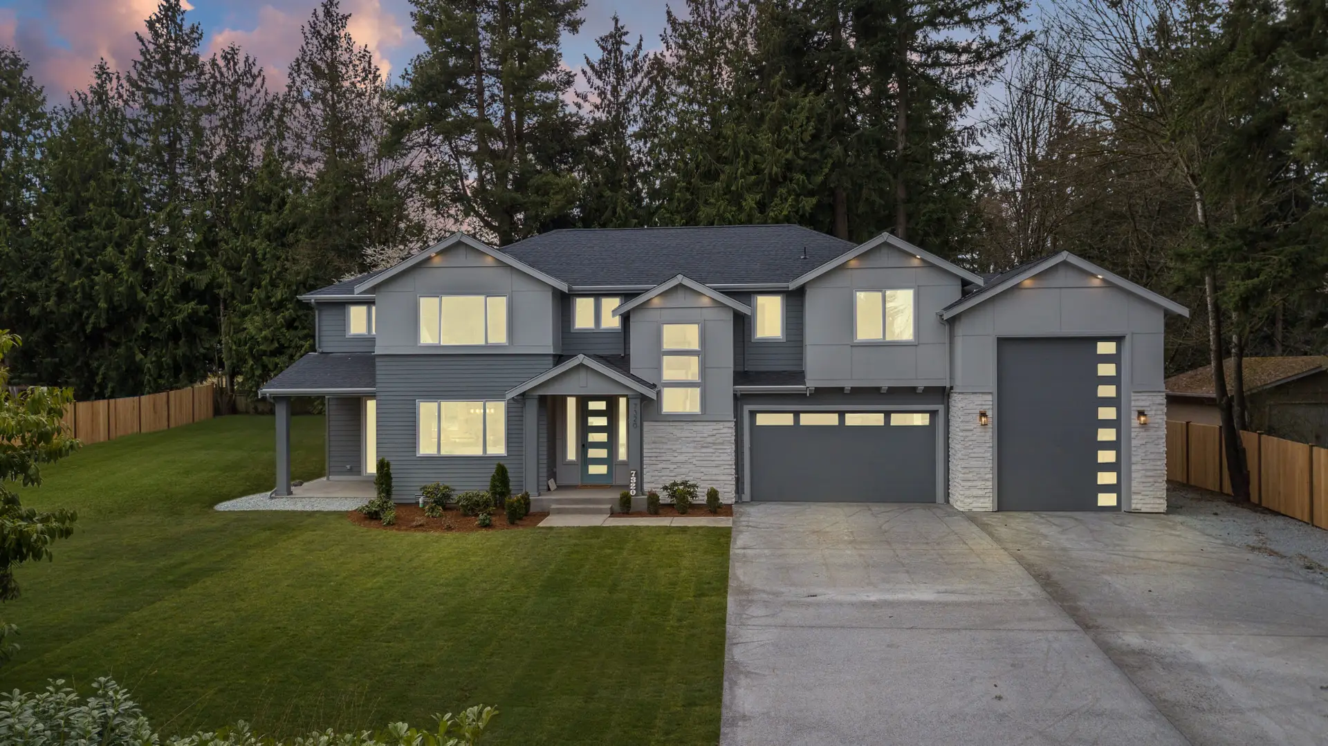 Twilight exterior real estate photo of a Pacific Northwest home listing